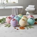 Aromatherapy shower bombs with botanicals on marble